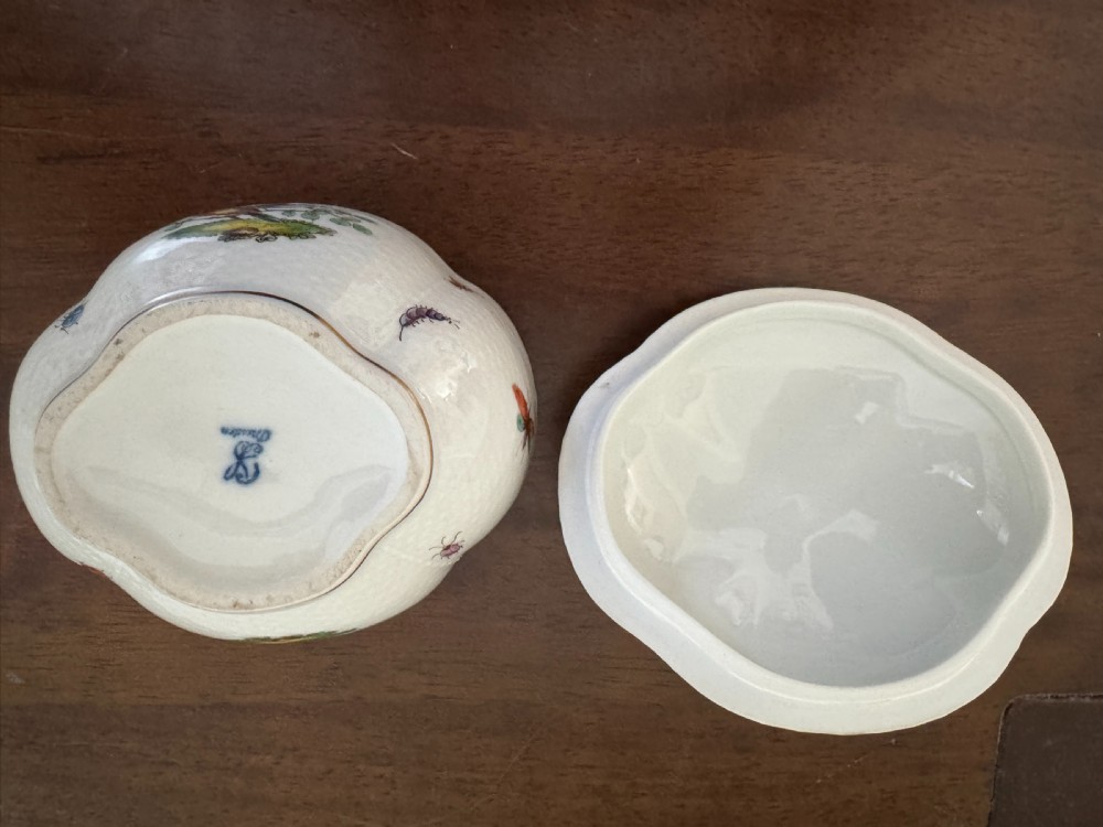 A white Dresden porcelain lidded bowl featuring relief basketweave moulding, hand-painted birds and insects, a branch handle, and gilt borders. View XI