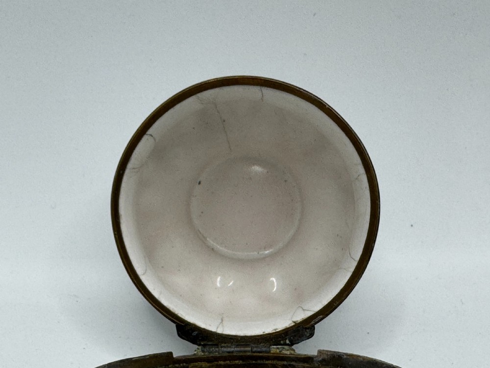 A white 18th-century Georgian Bilston enamel bonbonniere box decorated with hand-painted floral sprays and framed by brass metal mounts. View XIV