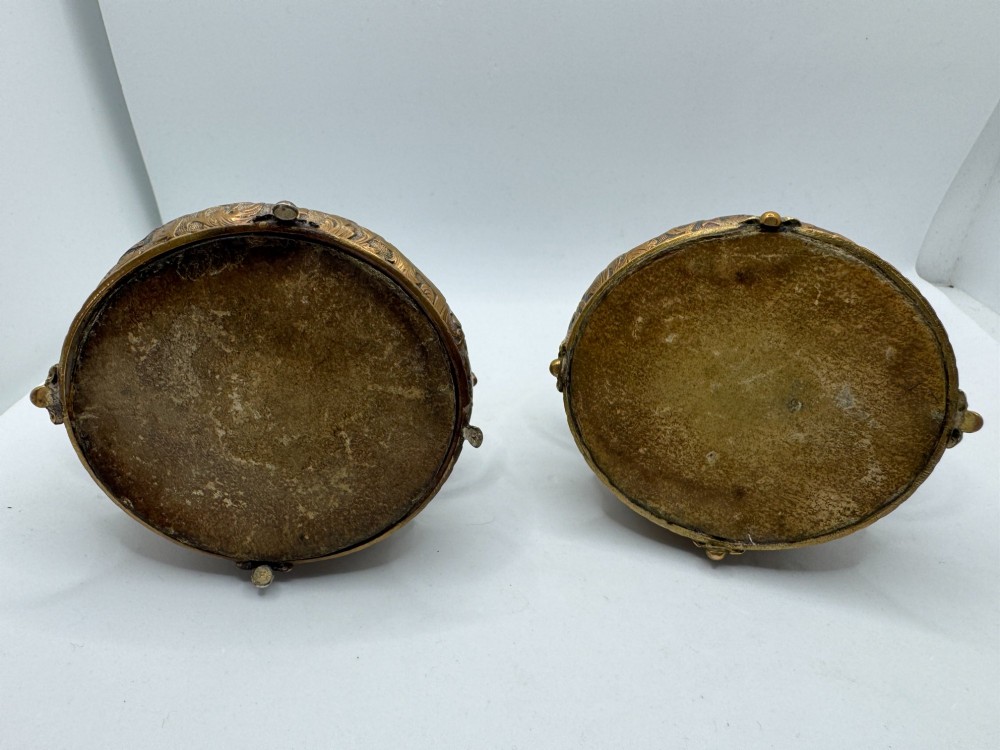 A pair of nineteenth-century gilt-metal jewellery caskets with acanthus leaf relief carving, side handles, and dog finials on the lids. View III