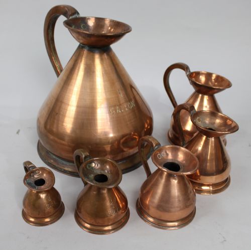 Set of 6 Antique Graduated Haystack Copper Jugs