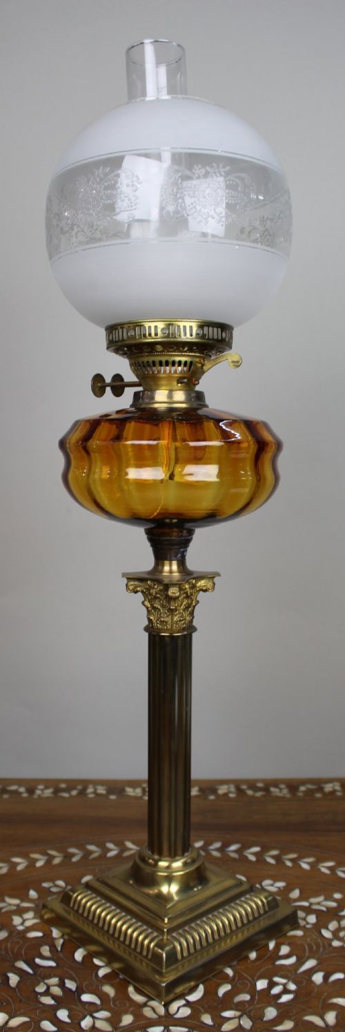 VICTORIAN BRASS OIL LAMP WITH AMBER GLASS FONT