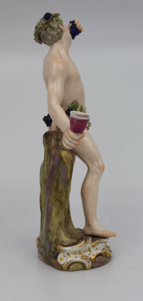 A set of four 19th-century hand-painted porcelain figurines representing the seasons standing on gilded scroll bases. View VIII