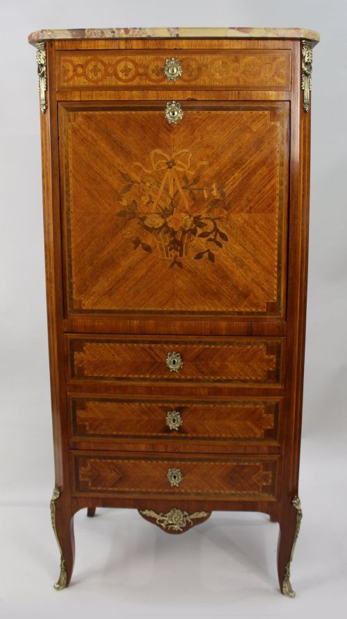 fig 1. A tall 19th-century French Louis XV style escritoire featuring floral marquetry inlays on a drop-front fall, three lower drawers, cabriole legs, gilt metal mounts, and a marble top.