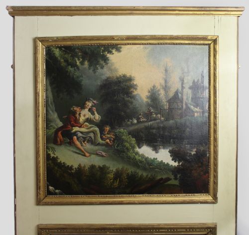fig 1. A tall French trumeau mirror featuring a cream painted wooden frame with gold beaded mouldings, an upper oil painting depicting a pastoral scene, and a rectangular mirror in the lower section.