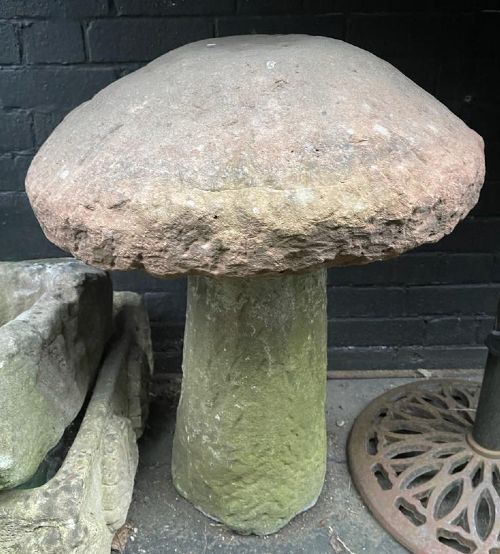 A two-piece antique sandstone staddle stone featuring a rounded mushroom cap resting on a tapered cylindrical pedestal base with moss coverage. View II