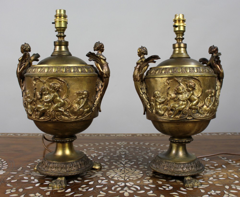 Pair of French Gilt Bronze Urn Lamps with Putti Reliefs, circa 1900