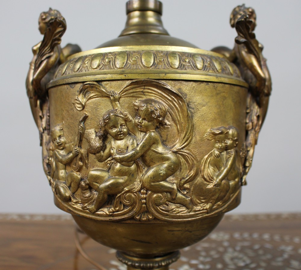 Pair of French Gilt Bronze Urn Lamps with Putti Reliefs, circa 1900 View IV