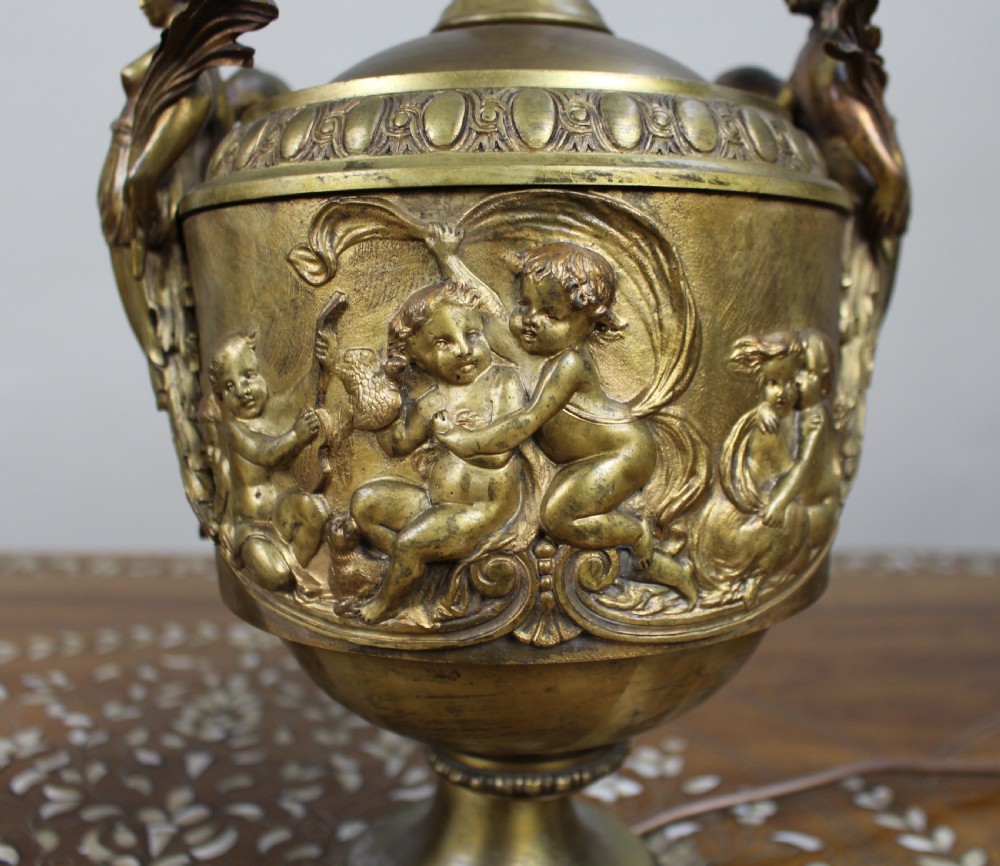 Pair of French Gilt Bronze Urn Lamps with Putti Reliefs, circa 1900 View VIII