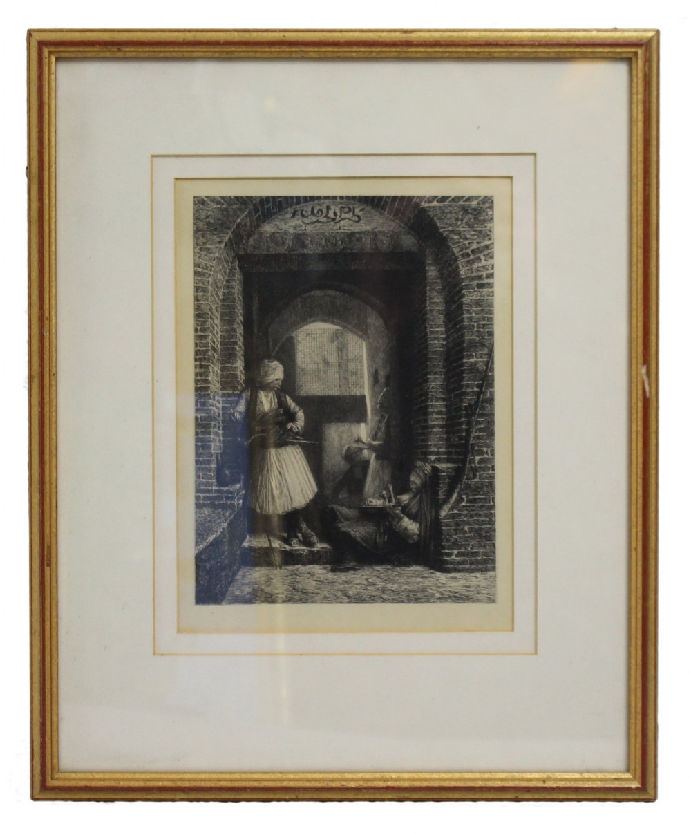 A Victorian monochrome etching depicting figures in traditional costume within an arched brick passage, presented inside a double mount and a thin gilded wooden frame.