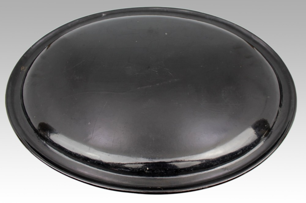 An oval Victorian black lacquered papier-mache tray featuring ornate gilt floral scrolls and iridescent mother-of-pearl leaf inlays around a central medallion. View XI