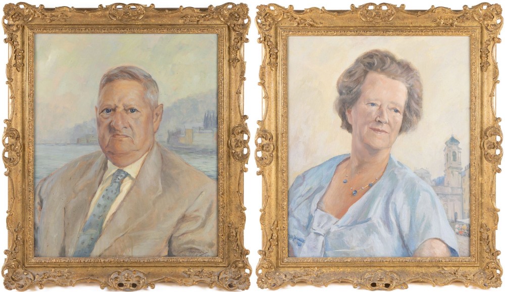 A pair of mid-20th-century oil portrait paintings depicting a gentleman and a lady in ornate swept gilt frames.
