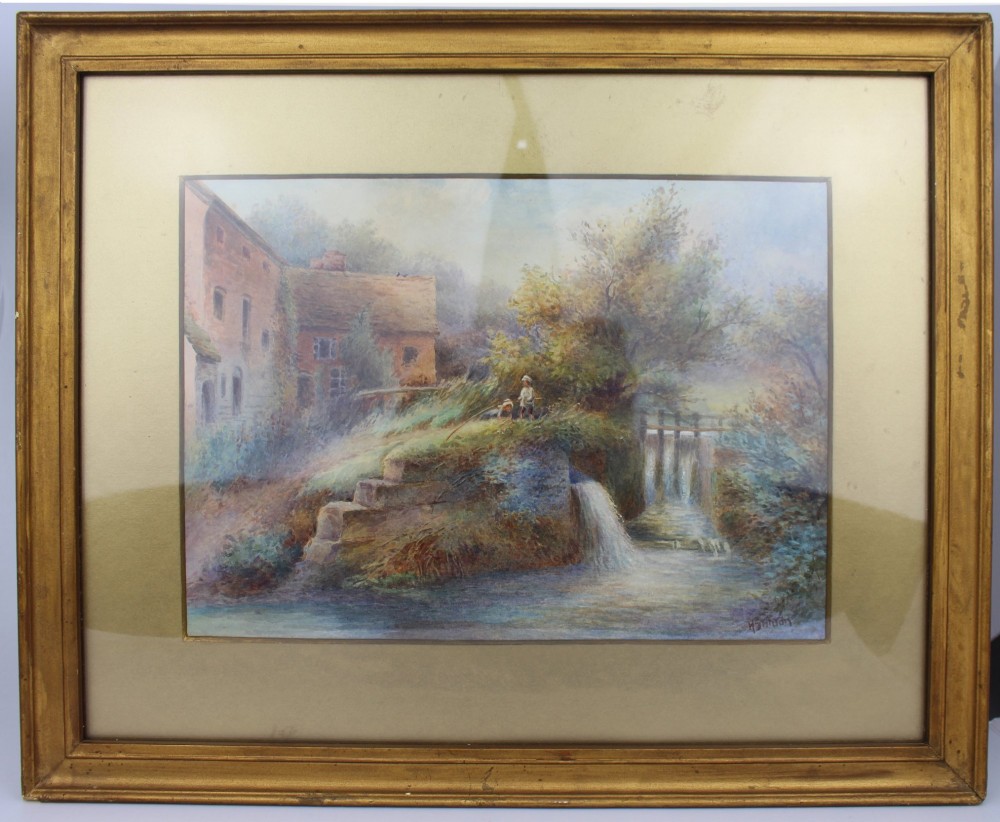 Framed antique watercolour painting by Harry Stinton depicting a rural landscape with a watermill, river, and figures in a gilt frame.
