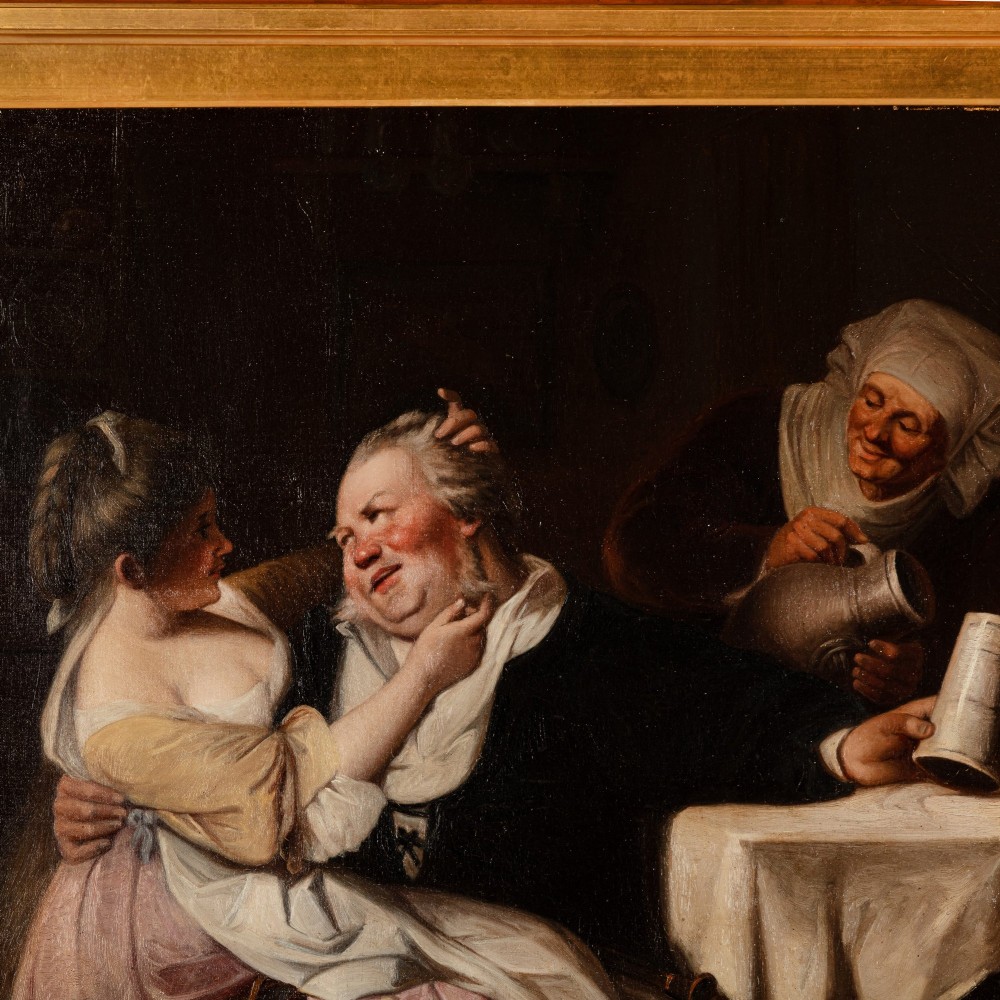 A late 19th-century oil painting depicting three figures in a tavern setting, presented in an ornate carved gold gilt frame. View III