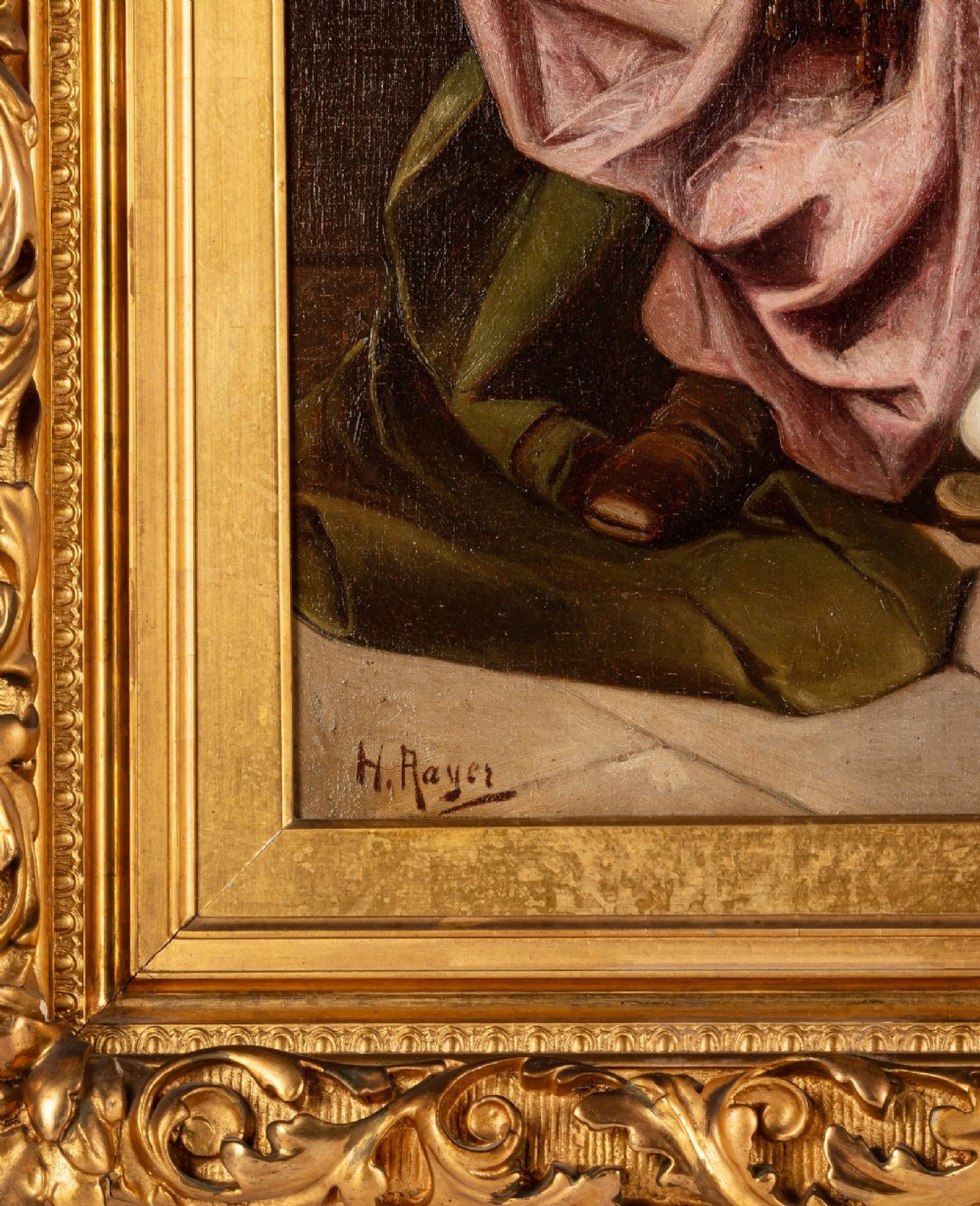 A late 19th-century oil painting depicting three figures in a tavern setting, presented in an ornate carved gold gilt frame. View V