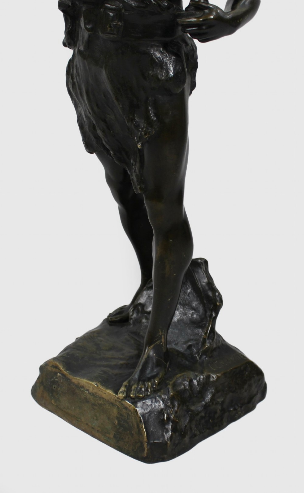 A dark brown patinated bronze figure of a classical male standing on a rocky base, holding a chalice in one hand and raising a laurel wreath aloft in the other. View XV