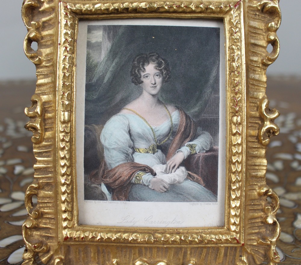 An early 19th-century coloured mezzotint portrait print depicting Lady Carrington, presented inside an ornate carved gold-gilded frame. View II