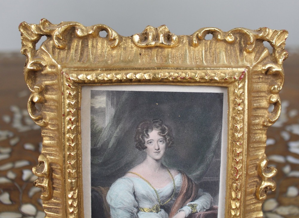 An early 19th-century coloured mezzotint portrait print depicting Lady Carrington, presented inside an ornate carved gold-gilded frame. View IV