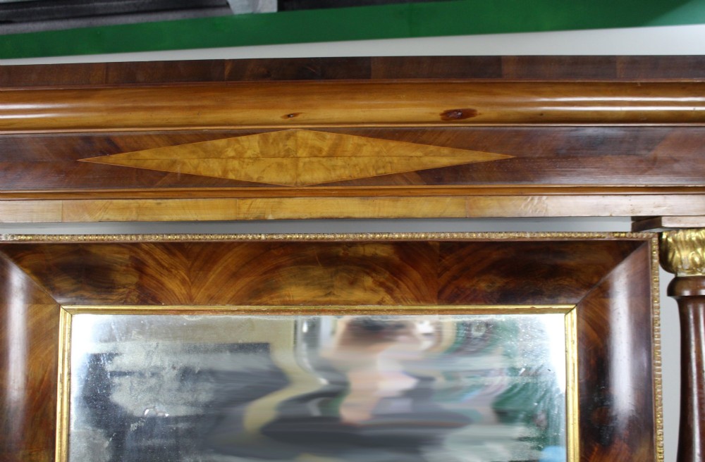 An antique mahogany pier console table featuring carved parcel gilt columns, ebonised monopodia legs with paw feet, and an integrated rectangular pier mirror. View VIII