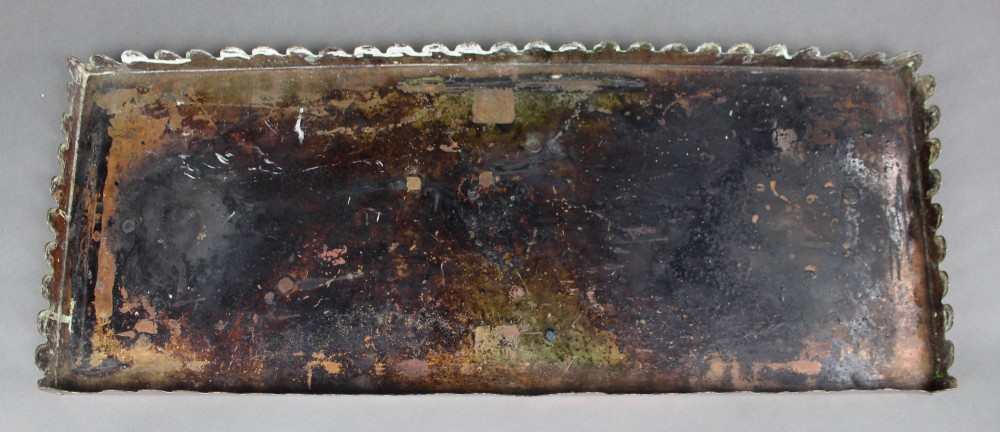 A rectangular Georgian copper hearth plate featuring a scalloped lower edge and a polished metallic surface. View IV