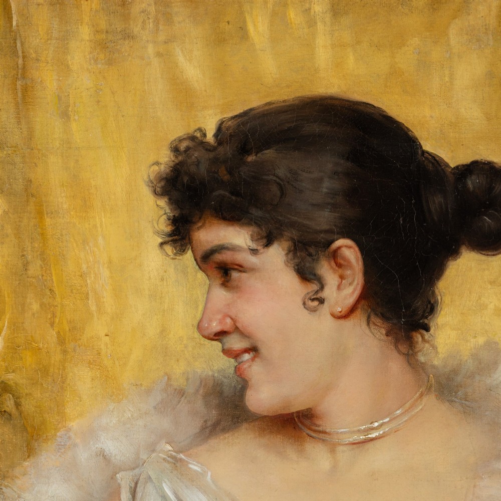 An antique oil painting on canvas depicting a smiling young woman wearing a light dress and feather stole inside an ornate gold gilt frame. View III
