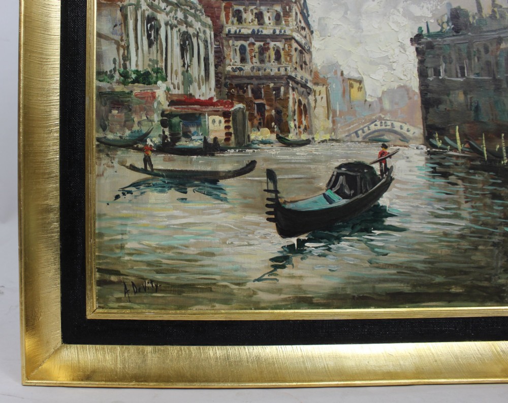 An oil painting on canvas depicting a Venetian canal with gondolas and historic architecture, presented in a gold and black frame. View V