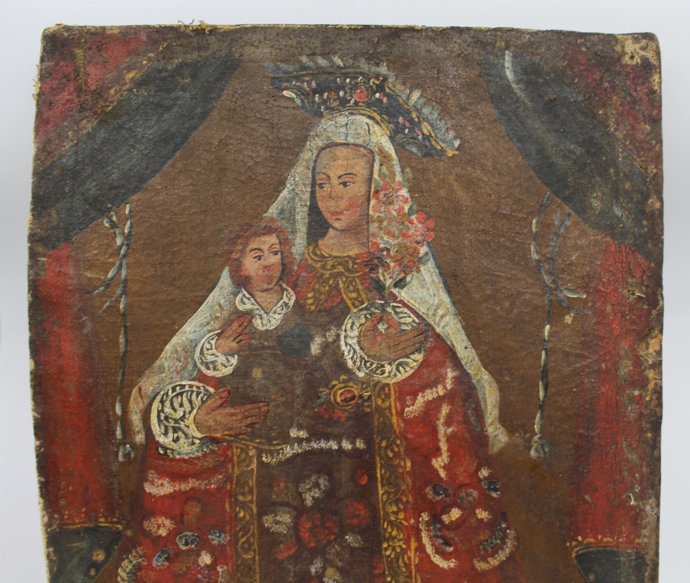 An 18th-century Andean colonial oil painting on canvas depicting the Madonna and Child clad in decorative red and gold patterned garments with a lace veil. View III