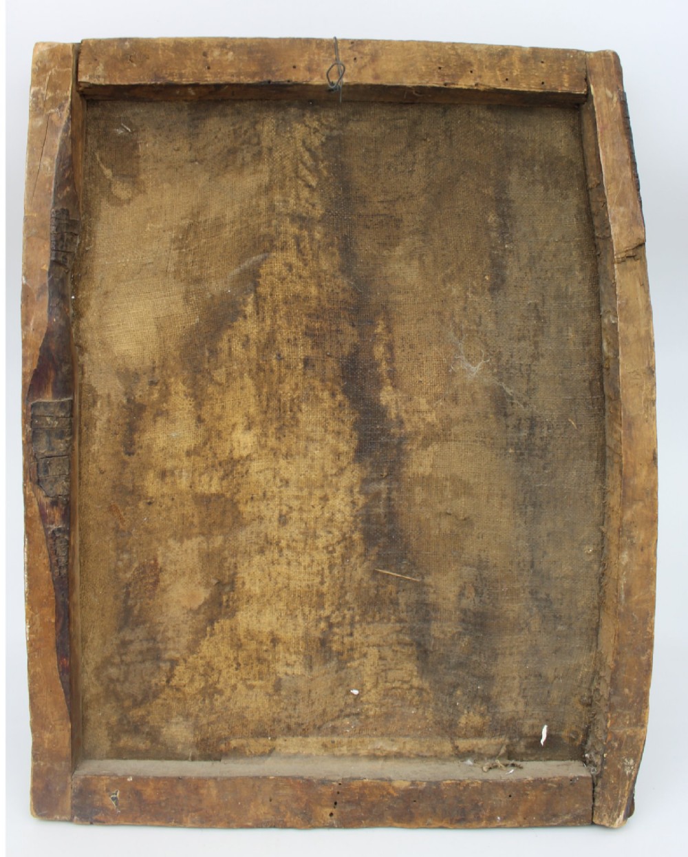 An 18th-century Andean colonial oil painting on canvas depicting the Madonna and Child clad in decorative red and gold patterned garments with a lace veil. View V