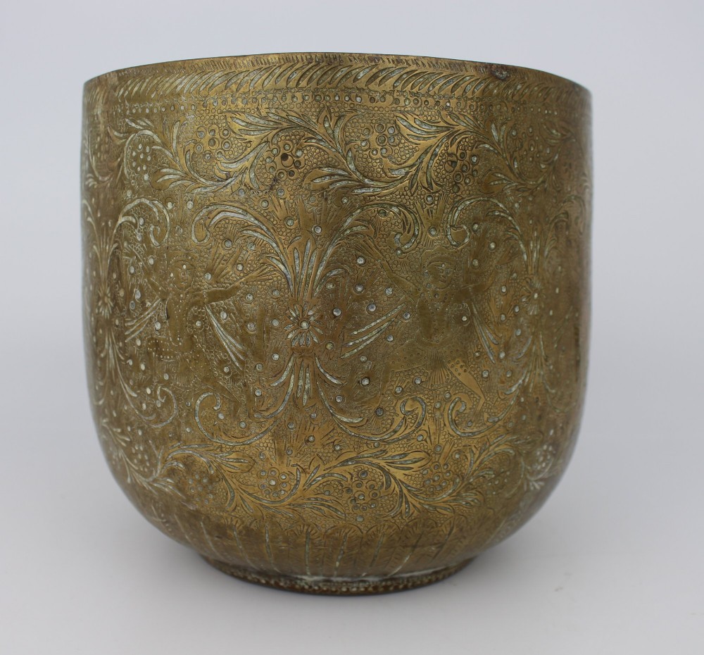 A rounded antique brass cachepot featuring densely hand-engraved floral foliage, figural motifs, and stippled background detailing. View II