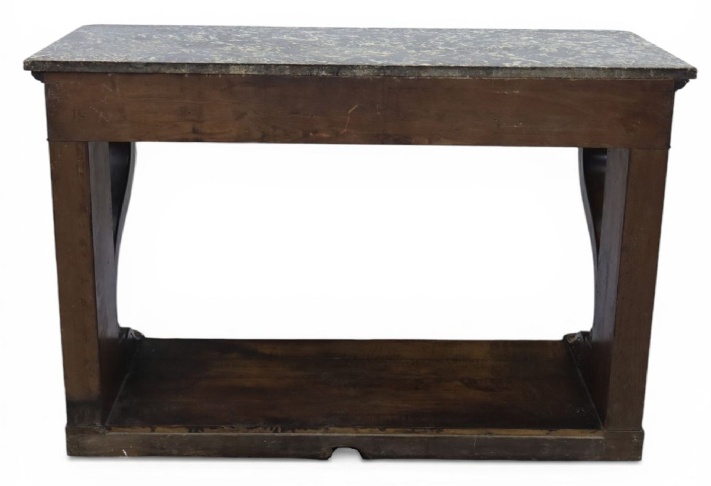 An antique dark mahogany French console table featuring a grey and white mottled marble top, curved scroll legs, and a low plinth shelf. View XII