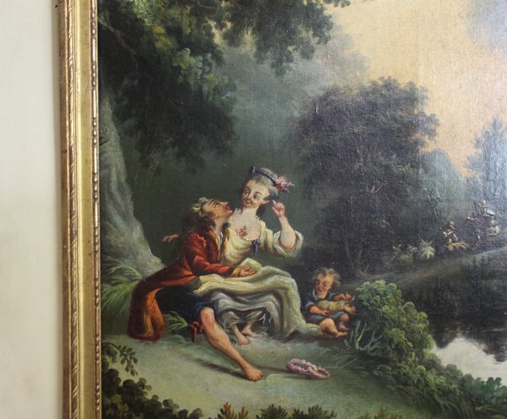 A tall cream-painted trumeau wall mirror featuring a gilt-framed pastoral oil painting set above a rectangular mirror glass within an architectural frame. View III