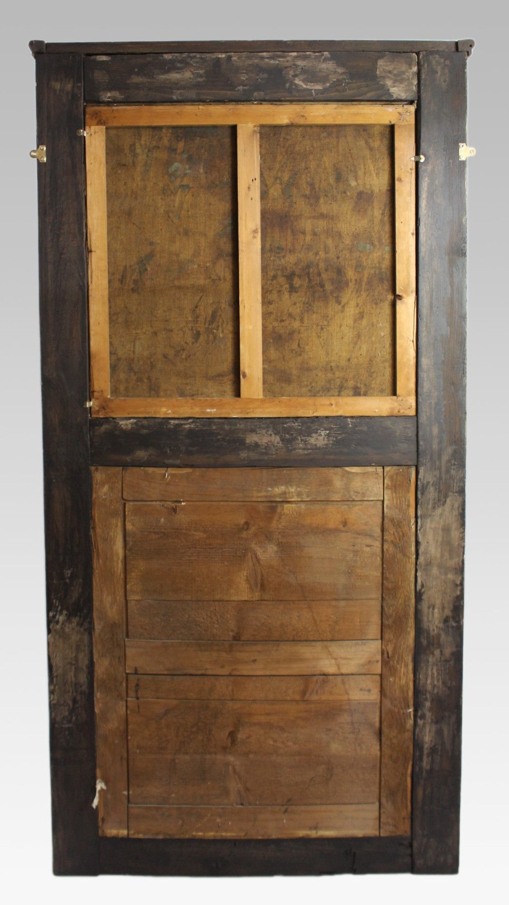 A tall cream-painted trumeau wall mirror featuring a gilt-framed pastoral oil painting set above a rectangular mirror glass within an architectural frame. View VII
