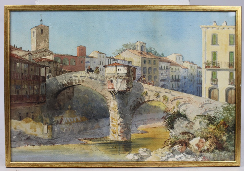 A 19th-century framed watercolour painting depicting an Italian townscape with a stone arch bridge crossing a river beneath a pale blue sky.