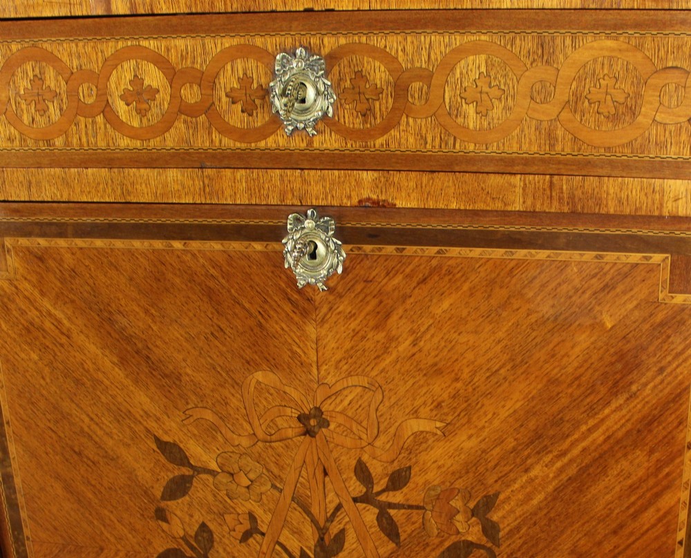 A tall 19th-century French Louis XV style escritoire featuring floral marquetry inlays on a drop-front fall, three lower drawers, cabriole legs, gilt metal mounts, and a marble top. View VII