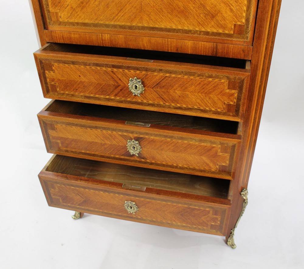 A tall 19th-century French Louis XV style escritoire featuring floral marquetry inlays on a drop-front fall, three lower drawers, cabriole legs, gilt metal mounts, and a marble top. View X