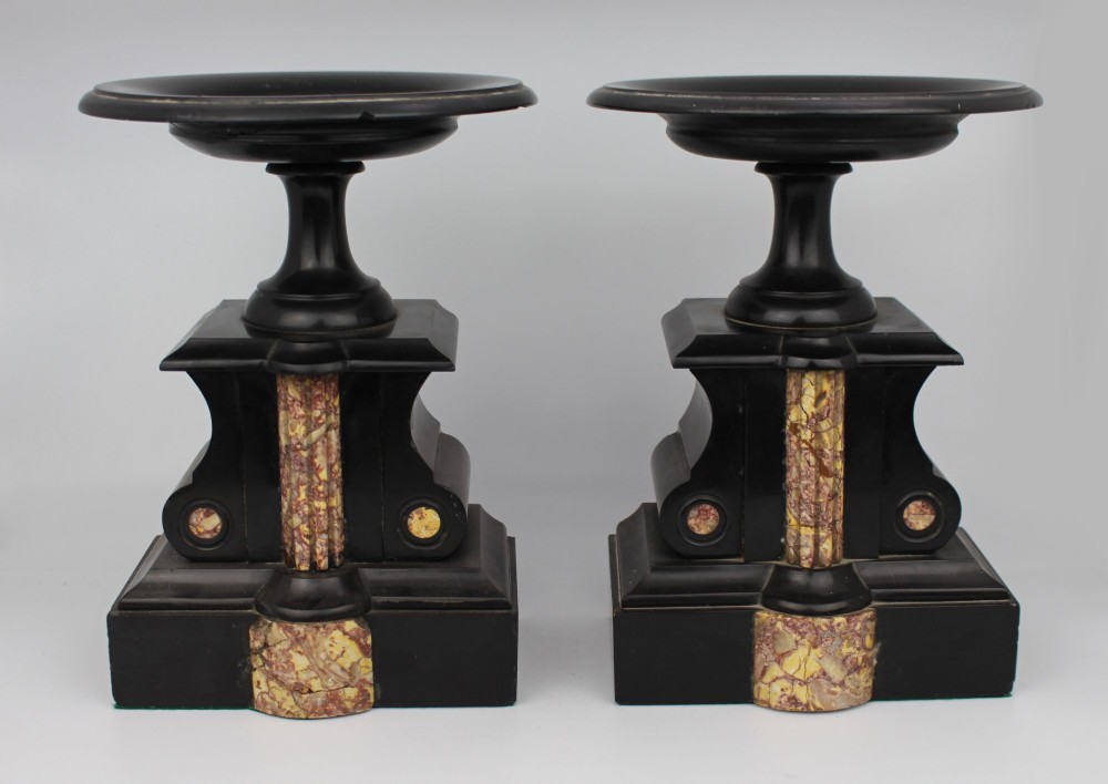 A 19th-century French black slate and red variegated marble clock garniture set with a central architectural clock and flanking side tazzas. View XI