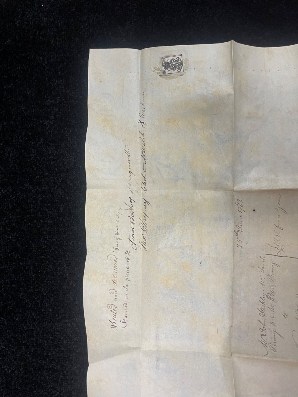An 1782 handwritten George III vellum tripartite legal indenture featuring ornate calligraphy, a blue revenue stamp, and three red wax seals along the bottom edge. View VIII