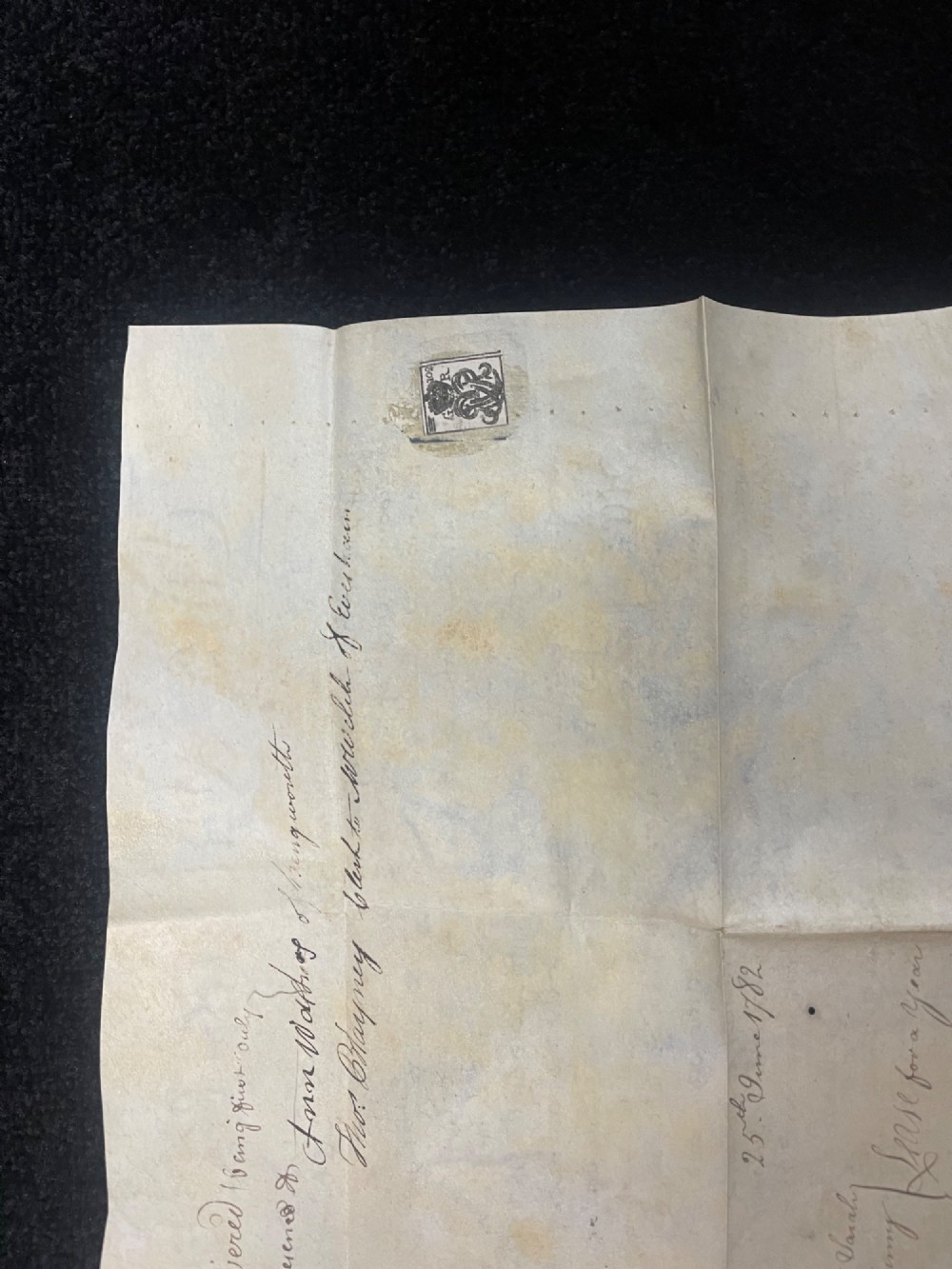 An 1782 handwritten George III vellum tripartite legal indenture featuring ornate calligraphy, a blue revenue stamp, and three red wax seals along the bottom edge. View IX