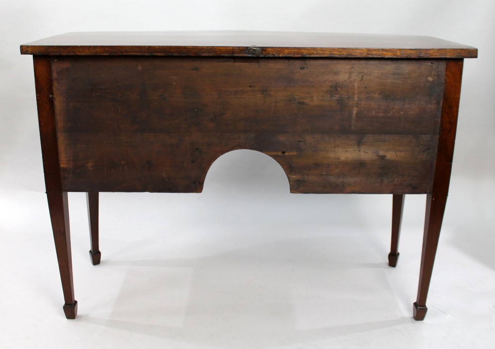 A George III bow-fronted mahogany serving table with brass oval handles, stringing inlay, and square tapered legs. View VIII