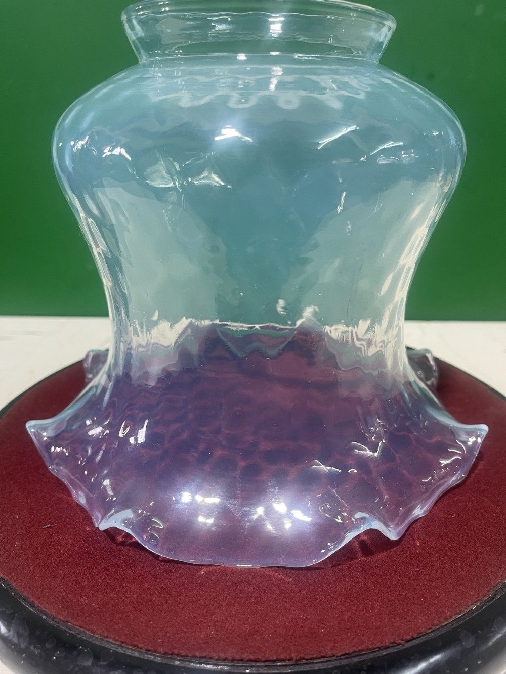 A pair of Victorian opalescent glass light shades featuring flared wavy lower rims and a pale blue translucent finish. View IV