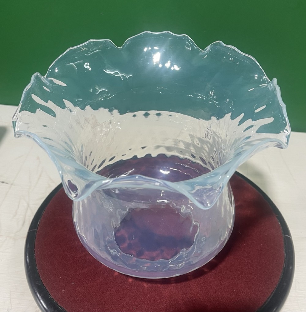 A pair of Victorian opalescent glass light shades featuring flared wavy lower rims and a pale blue translucent finish. View VI