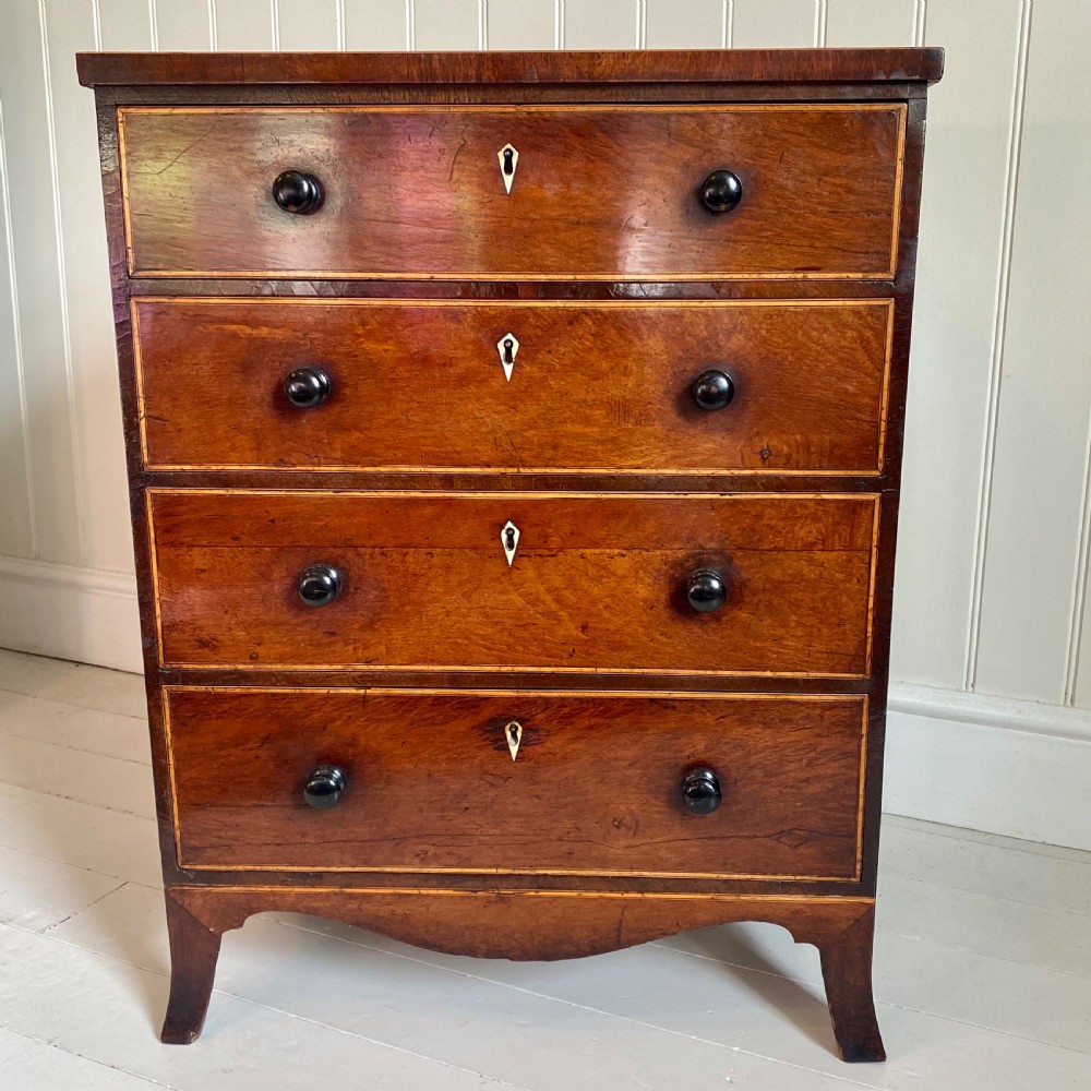Regency partridge wood chest of drawers View II