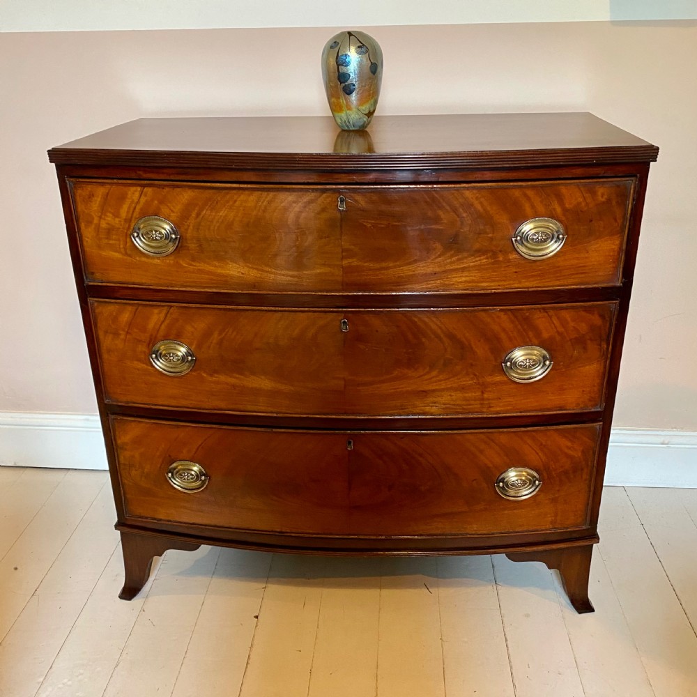 19th century bow front chest of drawers  View II