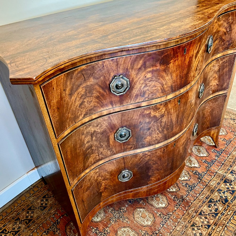 Georgian serpentine chest of drawers View III