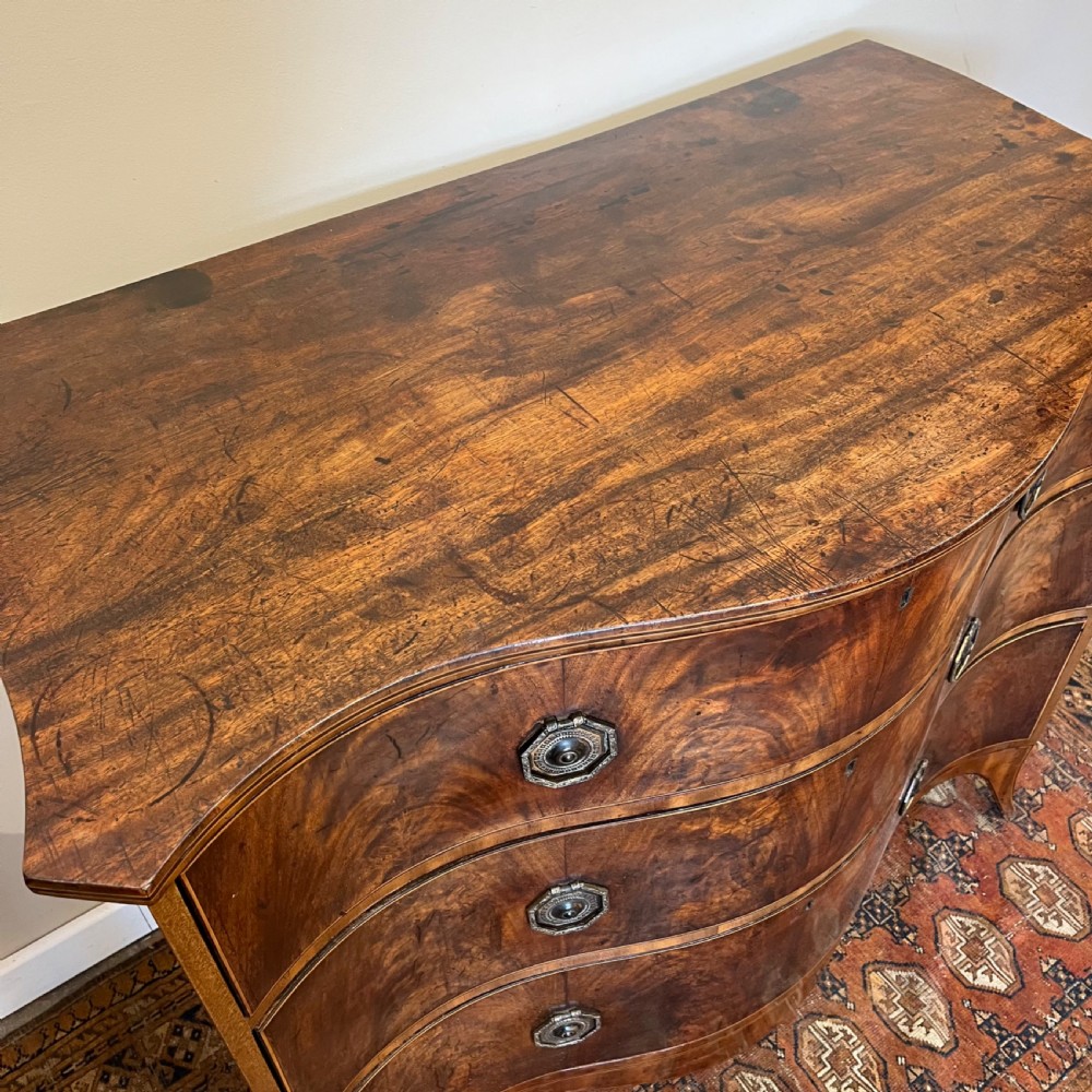 Georgian serpentine chest of drawers View IV