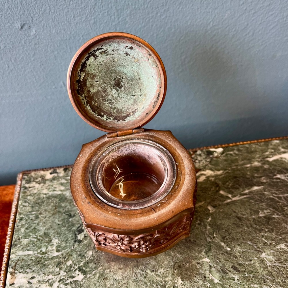 A French green marble desk set featuring a rectangular inkstand base with two raised gilt ormolu inkwells, a carved pen tray, ornate corner feet, and a matching marble rocking blotter. View VI