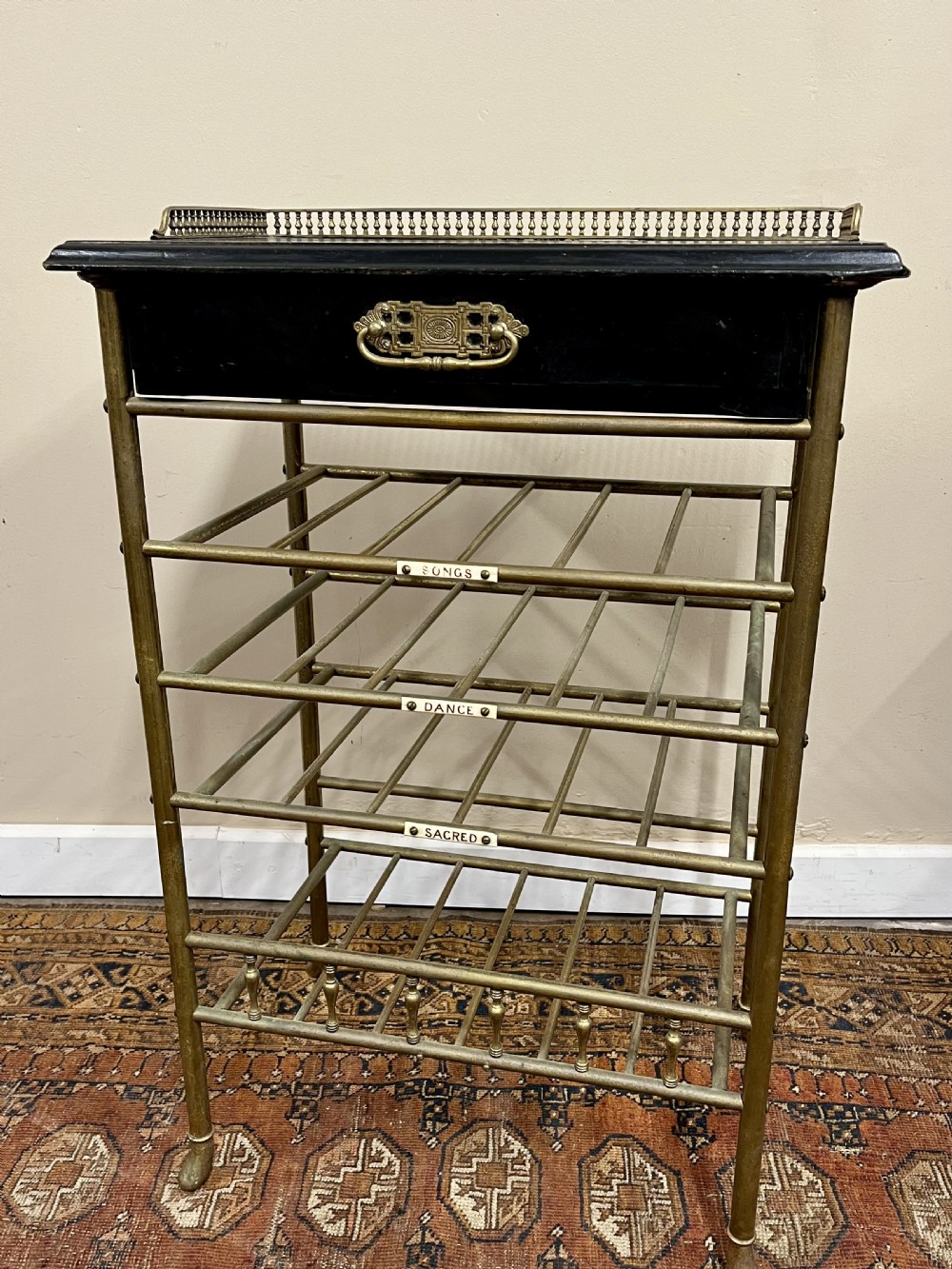 19th century ebonised and brass sheet music stand shelves View II