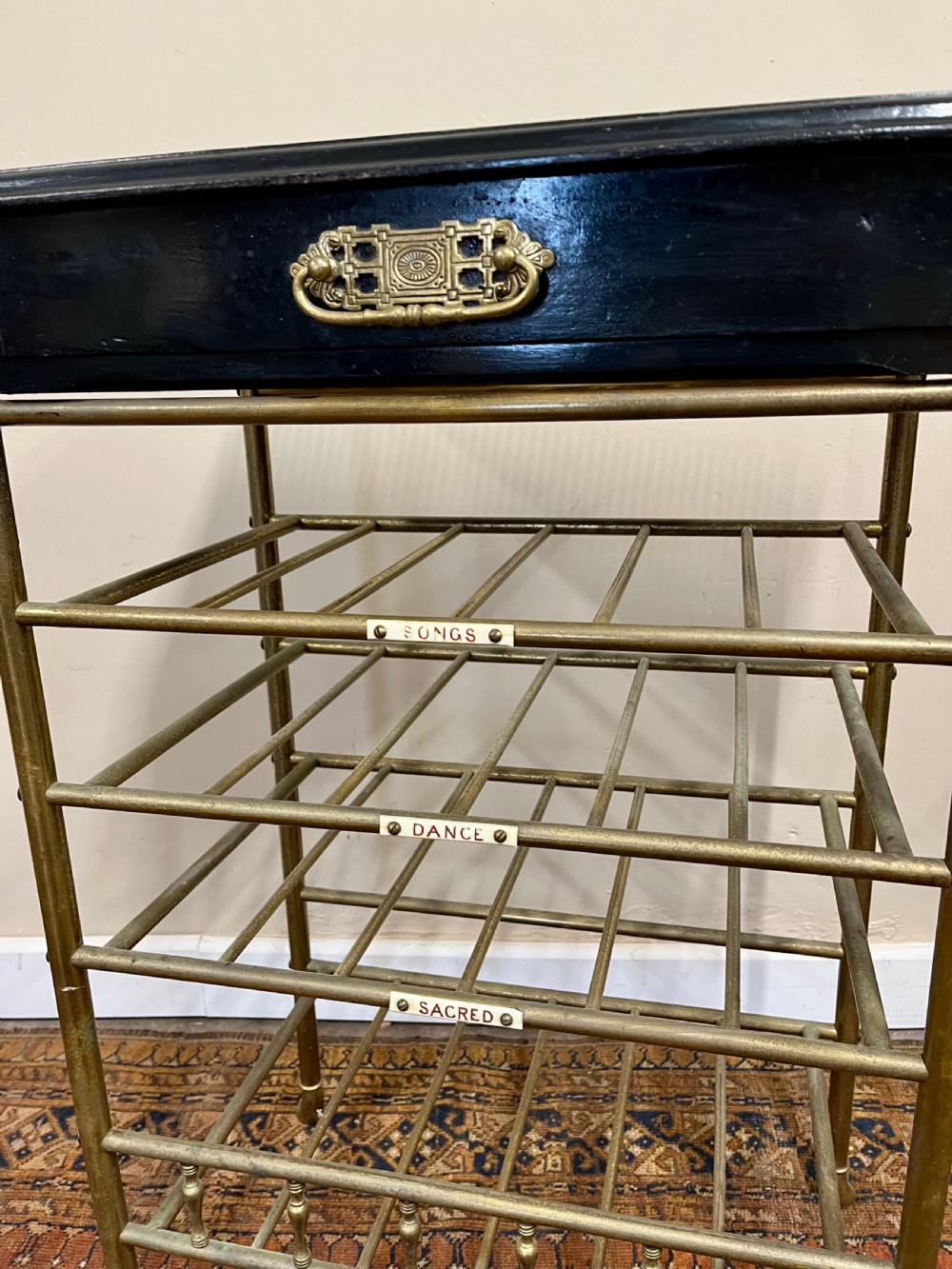 19th century ebonised and brass sheet music stand shelves View III