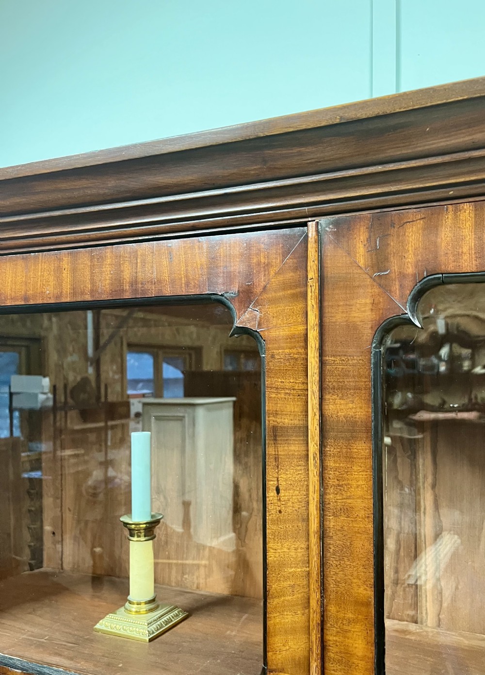 A tall 19th-century mahogany glazed bookcase featuring two double doors with multi-paned glass windows and a moulded top cornice. View VII