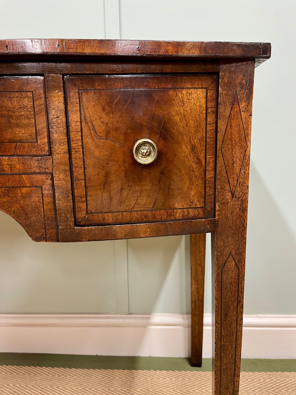 Georgian mahogany bow fronted table View V