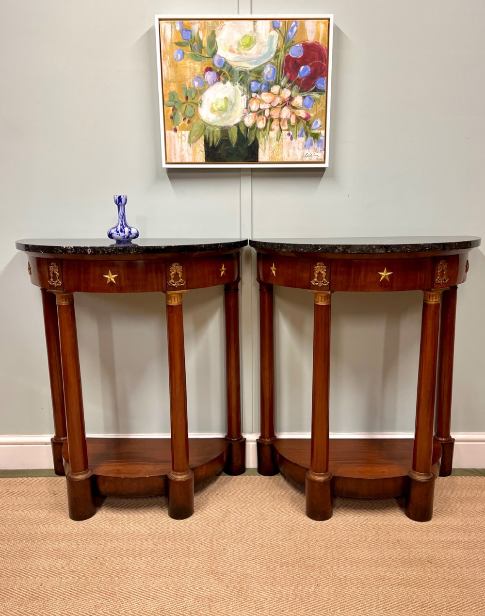 Pair of 19th century French empire style consoles